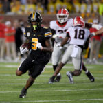 
              Missouri wide receiver Luther Burden III runs with the ball after a catch during the first half of an NCAA college football game against Georgia Saturday, Oct. 1, 2022, in Columbia, Mo. (AP Photo/L.G. Patterson)
            