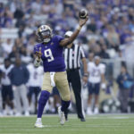 Washington quarterback Michael Penix Jr. throws a touchdown pass against Arizona during the first half on an NCAA football game, Saturday, Oct. 15, 2022, in Seattle. (AP Photo/John Froschauer)