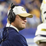 
              Georgia Tech interim  head coach Brent Key talks to the team along the sideline during the first half of an NCAA college football game against Pittsburgh, Saturday, Oct. 1, 2022, in Pittsburgh. (AP Photo/Keith Srakocic)
            