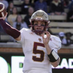 Boston College quarterback Phil Jurkovec (5) looks to pass against Wake Forest during the first half of an NCAA college football game in Winston-Salem, N.C., Saturday, Oct. 22, 2022. (AP Photo/Chuck Burton)