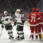 
              Minnesota Wild's Kirill Kaprizov (97) is congratulated by teammates after scoring a goal against the Detroit Red Wings during the first period of an NHL hockey game, Saturday, Oct. 29, 2022, in Detroit. (AP Photo/Jose Juarez)
            