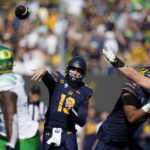 
              California quarterback Jack Plummer (13) throws a pass against Oregon during the first half of an NCAA college football game in Berkeley, Calif., Saturday, Oct. 29, 2022. (AP Photo/Godofredo A. Vásquez)
            