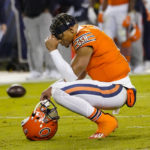 
              Chicago Bears quarterback Justin Fields after falling to score in the closing minute of the second half of an NFL football game against the Washington Commanders in Chicago, Thursday, Oct. 13, 2022. The Commanders defeated the Bears 12-7. (AP Photo/Charles Rex Arbogast)
            