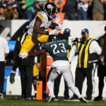 
              Pittsburgh Steelers linebacker Marcus Allen (27) attempts to leap over Philadelphia Eagles safety C.J. Gardner-Johnson during the second half of an NFL football game between the Pittsburgh Steelers and Philadelphia Eagles, Sunday, Oct. 30, 2022, in Philadelphia. (AP Photo/Matt Slocum)
            