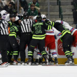 Dallas Stars and New York Rangers players fight after a penalty during the first period of an NHL hockey game in Dallas, Saturday, Oct. 29, 2022. (AP Photo/Michael Ainsworth)