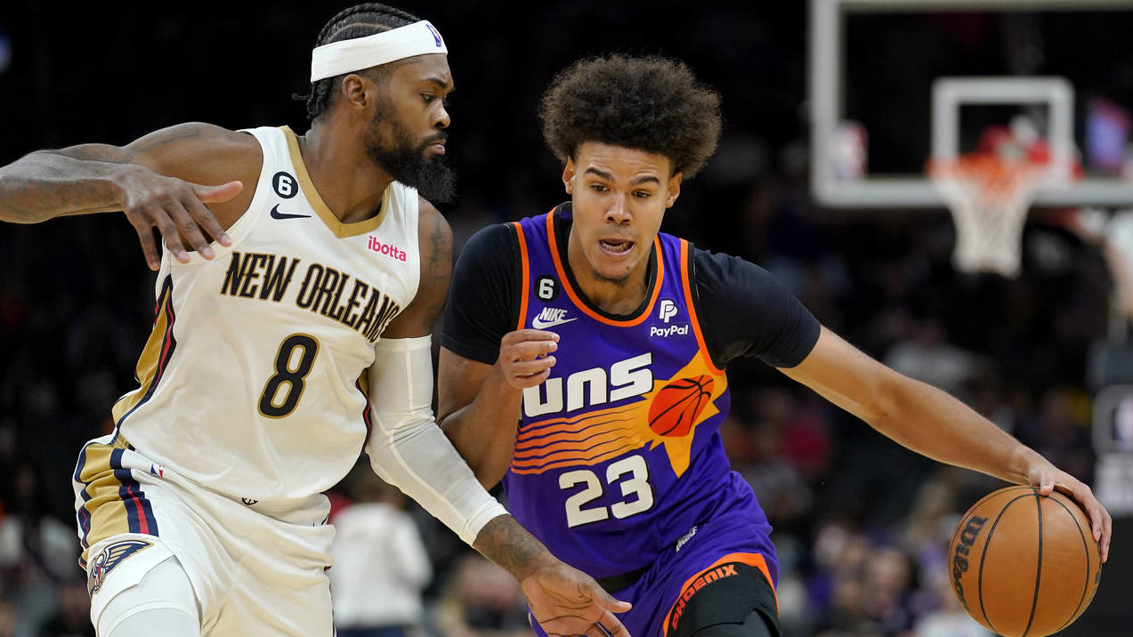 Phoenix Suns forward Cameron Johnson (23) drives against New Orleans Pelicans forward Naji Marshall...