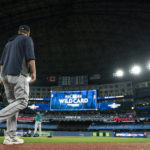 The Seattle Mariners take to the field  during a baseball workout, Thursday, Oct. 6, 2022, in Toronto, ahead of the team's wildcard playoff game against the Toronto Blue Jays. (Alex Lupul/The Canadian Press via AP)