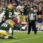 Green Bay Packers place kicker Mason Crosby (2) kicks a 31-yard field goal during overtime in an NFL football game against the New England Patriots, Sunday, Oct. 2, 2022, in Green Bay, Wis. The Packers won 27-24. (AP Photo/Morry Gash)