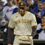 San Diego Padres starting pitcher Joe Musgrove (44) reacts at the end of the seventh inning of Game 3 of a National League wild-card baseball playoff series against the New York Mets, Sunday, Oct. 9, 2022, in New York. (AP Photo/John Minchillo)