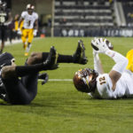 
              Arizona State tight end Jalin Conyers, right, tumbles into the end zone after catching a pass for a touchdown as Colorado cornerback Jason Oliver defends in the second half of an NCAA college football game Saturday, Oct. 29, 2022, in Boulder, Colo. (AP Photo/David Zalubowski)
            
