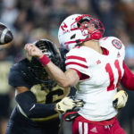 Purdue linebacker Jalen Graham (6) hits Nebraska quarterback Casey Thompson (11) to force a fumble during the first half of an NCAA college football game in West Lafayette, Ind., Saturday, Oct. 15, 2022. Nebraska recovered the ball (AP Photo/Michael Conroy)