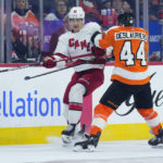 Philadelphia Flyers' Nicolas Deslauriers, right, and Carolina Hurricanes' Teuvo Teravainen collide during the second period of an NHL hockey game, Saturday, Oct. 29, 2022, in Philadelphia. (AP Photo/Matt Slocum)