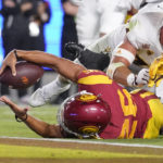 Southern California running back Travis Dye is stopped just short of a touchdown during the first half of an NCAA college football game against Arizona State Saturday, Oct. 1, 2022, in Los Angeles. (AP Photo/Mark J. Terrill)