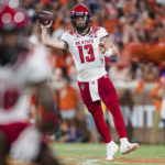 
              North Carolina State quarterback Devin Leary (13) passes the ball in the first half of an NCAA college football game against Clemson, Saturday, Oct. 1, 2022, in Clemson, S.C. (AP Photo/Jacob Kupferman)
            