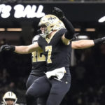 
              New Orleans Saints' Taysom Hill (7) and Chase Hansen celebrate after Hill recovered a fumble on a Seattle Seahawks fake punt during an NFL football game in New Orleans, Sunday, Oct. 9, 2022. (AP Photo/Gerald Herbert)
            