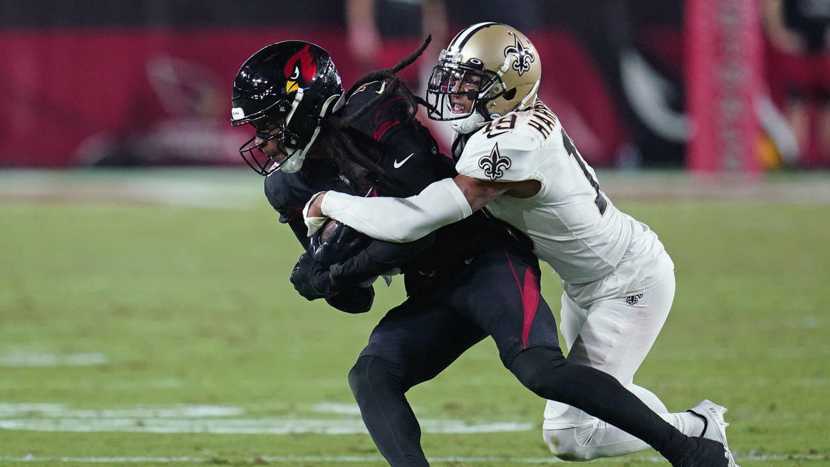 Arizona Cardinals wide receiver DeAndre Hopkins pulls in a pass against New Orleans Saints safety C...