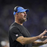 
              Detroit Lions head coach Dan Campbell signals from the sideline during the first half of an NFL football game against the Seattle Seahawks, Sunday, Oct. 2, 2022, in Detroit. (AP Photo/Paul Sancya)
            