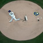Milwaukee Brewers starting pitcher Eric Lauer throws during the first inning of a baseball game against the Arizona Diamondbacks Tuesday, Oct. 4, 2022, in Milwaukee. (AP Photo/Morry Gash)