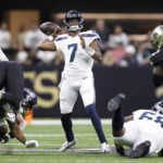 Seattle Seahawks quarterback Geno Smith passes during an NFL football game against the New Orleans Saints in New Orleans, Saturday, Oct. 8, 2022. (AP Photo/Derick Hingle)
