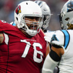 Arizona Cardinals guard Will Hernandez reacts during the second half of an NFL football game against the Carolina Panthers on Sunday, Oct. 2, 2022, in Charlotte, N.C. Hernandez was disqualify left the game. (AP Photo/Jacob Kupferman)
