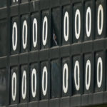 
              A worker changes the scoreboard in a scoreless game during the 15th inning in Game 3 of an American League Division Series baseball game between the Seattle Mariners and the Houston Astros, Saturday, Oct. 15, 2022, in Seattle. (AP Photo/Stephen Brashear)
            
