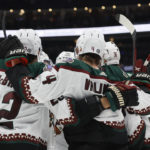 Arizona Coyotes players celebrate their goal against the Columbus Blue Jackets during the third period of an NHL hockey game Tuesday, Oct. 25, 2022, in Columbus, Ohio. (AP Photo/Jay LaPrete)