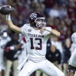 Texas A&M quarterback Haynes King (13) throws the ball against Alabama during the first half of an NCAA college football game, Saturday, Oct. 8, 2022, in Tuscaloosa, Ala. (AP Photo/Vasha Hunt)