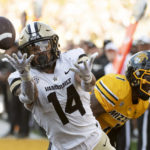 
              Vanderbilt wide receiver Will Sheppard, left, bobbles and drops a pass in front of Missouri defensive back Jaylon Carlies, right, during the second quarter of an NCAA college football game Saturday, Oct. 22, 2022, in Columbia, Mo. (AP Photo/L.G. Patterson)
            