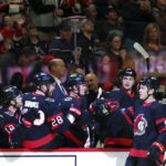 
              Ottawa Senators center Shane Pinto (57) celebrates with teammates after scoring a goal against the Arizona Coyotes during the first period of an NHL hockey game in Ottawa, Ontario on Saturday, Oct. 22, 2022. (Sean Kilpatrick/The Canadian Press via AP)
            