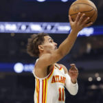 
              Atlanta Hawks guard Trae Young (11) shoots against the Milwaukee Bucks during the first half of an NBA basketball game, Saturday, Oct. 29, 2022, in Milwaukee. (AP Photo/Jeffrey Phelps)
            