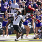 
              TCU wide receiver Quentin Johnston (1) catches a pass as Oklahoma State cornerback Jabbar Muhammad (7) defends during the first half of an NCAA college football game in Fort Worth, Texas, Saturday, Oct. 15, 2022. (AP Photo/Sam Hodde)
            