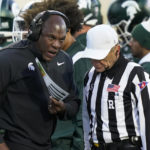 
              Michigan State coach Mel Tucker talks to the referee during the second half of the team's NCAA college football game against Ohio State, Saturday, Oct. 8, 2022, in East Lansing, Mich. (AP Photo/Carlos Osorio)
            