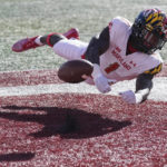 Maryland wide receiver Rakim Jarrett dives as he tries to make a catch during the first half of an NCAA college football game against Indiana, Saturday, Oct. 15, 2022, in Bloomington, Ind. The pass was incomplete. (AP Photo/Darron Cummings)