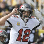 Tampa Bay Buccaneers quarterback Tom Brady (12) gives signals at the line of scrimmage during the first half of an NFL football game against the Pittsburgh Steelers in Pittsburgh, Sunday, Oct. 16, 2022. (AP Photo/Don Wright)