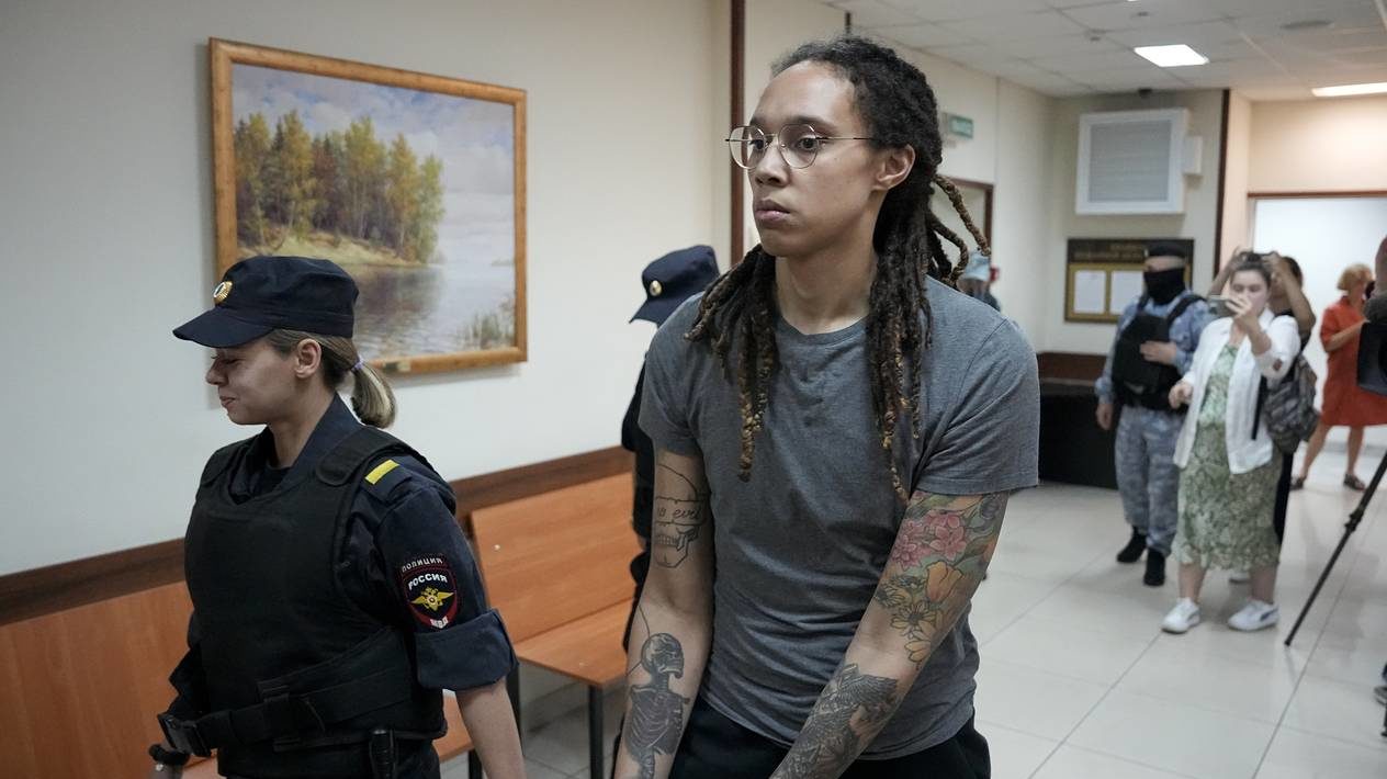 FILE - WNBA star and two-time Olympic gold medalist Brittney Griner is escorted from a court room a...