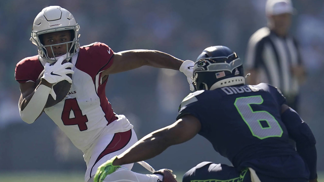 Arizona Cardinals wide receiver Rondale Moore (4) runs against Seattle Seahawks safety Quandre Digg...