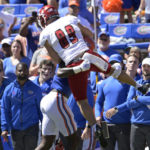 
              Eastern Washington wide receiver Efton Chism III (89) is tackled by Florida's Ja'Quavion Fraziars on a kickoff return during the first half of an NCAA college football game, Sunday, Oct. 2, 2022, in Gainesville, Fla. (AP Photo/Phelan M. Ebenhack)
            