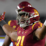Southern California defensive lineman Tyrone Taleni celebrates a sack during the second half of an NCAA college football game against Arizona State Saturday, Oct. 1, 2022, in Los Angeles. (AP Photo/Mark J. Terrill)