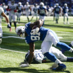 
              Indianapolis Colts tight end Mo Alie-Cox get past Tennessee Titans cornerback Kristian Fulton for a touchdown in the first half of an NFL football game in Indianapolis, Fla., Sunday, Oct. 2, 2022. (AP Photo/Darron Cummings)
            