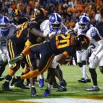 Tennessee running back Jaylen Wright (20) dives into the end zone for a touchdown during the first half of an NCAA college football game against Kentucky, Saturday, Oct. 29, 2022, in Knoxville, Tenn. (AP Photo/Wade Payne)