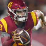 Southern California quarterback Caleb Williams rolls out during the first half of an NCAA college football game against Arizona State Saturday, Oct. 1, 2022, in Los Angeles. (AP Photo/Mark J. Terrill)