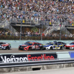 
              William Byron (24) leads the pack at the start of a NASCAR Cup Series auto race at Homestead-Miami Speedway, Sunday, Oct. 23, 2022, in Homestead, Fla. (AP Photo/Terry Renna)
            