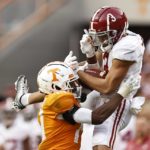 
              Alabama wide receiver Jermaine Burton (3) makes a catch as he's defended by Tennessee defensive back Christian Charles (14) during the second half of an NCAA college football game Saturday, Oct. 15, 2022, in Knoxville, Tenn. Tennessee won 52-49. (AP Photo/Wade Payne)
            