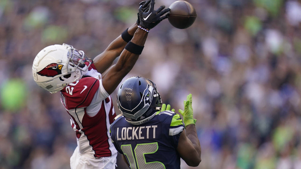 Arizona Cardinals cornerback Marco Wilson (20) breaks up a pass intended for Seattle Seahawks wide ...