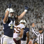 Penn State tight end Tyler Warren (44) celebrates after scoring a first-half touchdown against Minnesota during an NCAA college football game Saturday, Oct. 22, 2022, in State College, Pa. (AP Photo/Barry Reeger)