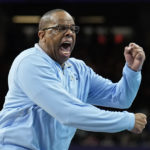 
              FILE - North Carolina head coach Hubert Davis reacts during the second half of a college basketball game against Kansas in the finals of the Men's Final Four NCAA tournament, Monday, April 4, 2022, in New Orleans. With four starters back from the team that blew a 15-point halftime lead to Kansas at the Superdome in New Orleans, the Tar Heels were the runaway pick as the preseason No. 1 in the AP Top 25 on Monday, Oct. 17, 2022. (AP Photo/Brynn Anderson, File)
            