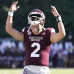Mississippi State quarterback Will Rogers gestures for a touchdown signal from the officials during the second half of an NCAA college football game against Texas A&M in Starkville, Miss., Saturday, Oct. 1, 2022. (AP Photo/Rogelio V. Solis)