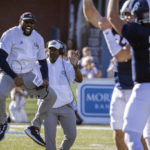 
              Georgia Southern defensive coordinator Will Harris, left, celebrates on the sidelines after a blocked punt and touchdown during the first half of an NCAA football game against James Madison, Saturday, Oct. 15, 2022, in Statesboro, Ga. (AP Photo/Stephen B. Morton)
            