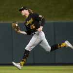 
              Pittsburgh Pirates right fielder Jack Suwinski catches a fly ball by St. Louis Cardinals' Lars Nootbaar during the third inning of a baseball game Saturday, Oct. 1, 2022, in St. Louis. (AP Photo/Jeff Roberson)
            