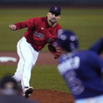
              Boston Red Sox starting pitcher Nathan Eovaldi strikes out Tampa Bay Rays' Wander Franco during the first inning of a baseball game Tuesday, Oct. 4, 2022, at Fenway Park, in Boston. (AP Photo/Charles Krupa)
            